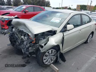 2019 Hyundai Accent SE z VIN 3KPC24A34KE045556, wystawiony jako IAAI lot #42207432 z przebiegiem 65 065 mil mil oraz . Historia ofert i sprzedaży dostępna na DreamBid. Obrazek 2.