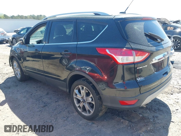 2015 Ford Escape Titanium with VIN 1FMCU0J91FUB36973, listed as a IAAI auction lot 41889560 with 93,445 mi miles and . Bid and sale history available at DreamBid. Image 3.