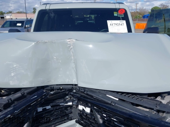 2022 Ford Bronco with VIN 1FMEE5DP1NLB51765, listed as a IAAI auction lot 41792547 with 24,666 mi miles. Bid and sale history available at carsss.com. Image 10.