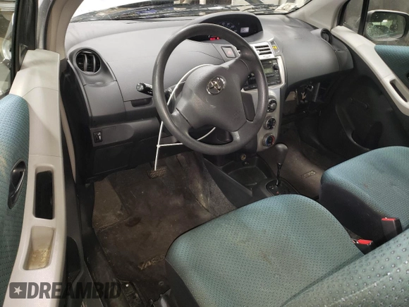 2007 Toyota Yaris with VIN JTDJT923275114473, listed as a Copart auction lot 52242355 with 137,963 mi miles and Salvage Title. Bid and sale history available at carsss.com. Image 8.