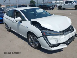 2018 Honda Clarity Plug-In Hybrid Touring with VIN JHMZC5F34JC010638, listed as a IAAI auction lot 41992548 with 51,106 mi miles. Bid and sale history available at carsss.com. Image 1.