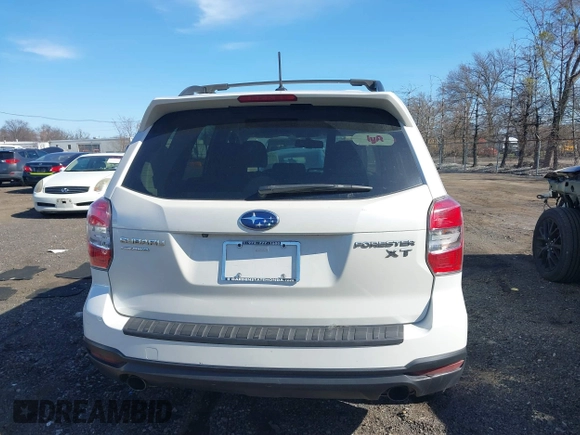 2014 Subaru Forester XT Touring with VIN JF2SJGMC4EH534647, listed as a IAAI auction lot 41828950 with 106,375 mi miles and . Bid and sale history available at DreamBid. Image 16.