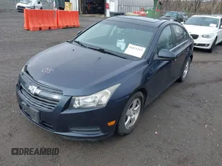 2013 Chevrolet Cruze 1LT with VIN 1G1PC5SB5D7312533, listed as a IAAI auction lot 41875213 with 94,953 mi miles and . Bid and sale history available at DreamBid. Image 2.