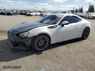 2015 Subaru BRZ Series.Blue with VIN JF1ZCAC12F9600988, listed as a Copart auction lot 45686235 with 142,887 mi miles and Salvage Title. Bid and sale history available at carsss.com. Image 1.