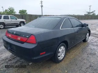 1999 Honda Accord EX z VIN 1HGCG3153XA022925, wystawiony jako IAAI lot #42377832 z przebiegiem 163 239 mil mil oraz . Historia ofert i sprzedaży dostępna na DreamBid. Obrazek 4.