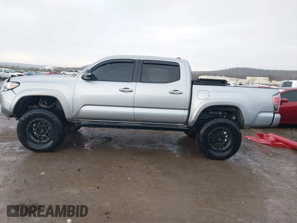 2018 Toyota Tacoma SR with VIN 5TFGZ5AN4JX142565, listed as a IAAI auction lot 41353718 with 87,544 mi miles and . Bid and sale history available at carsss.com. Image 14.