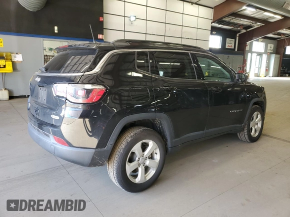 2019 Jeep Compass Latitude with VIN 3C4NJDBB0KT593907, listed as a Copart auction lot 50628525 with 46,111 mi miles and Salvage Title. Bid and sale history available at DreamBid. Image 3.