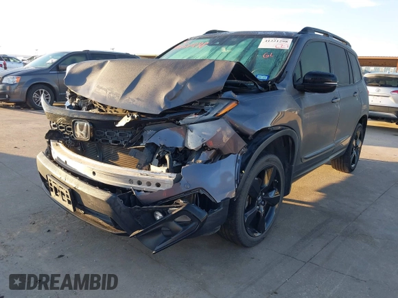 2019 Honda Passport Elite z VIN 5FNYF8H07KB015720, wystawiony jako IAAI lot #41221298 z przebiegiem 65 747 mil mil oraz . Historia ofert i sprzedaży dostępna na DreamBid. Obrazek 2.