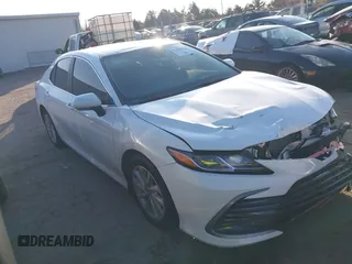 2024 Toyota Camry LE z VIN 4T1R11AK6RU888622, wystawiony jako IAAI lot #41102520 z przebiegiem 12 717 mil mil oraz . Historia ofert i sprzedaży dostępna na DreamBid. Obrazek 13.