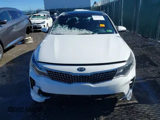 2016 Kia Optima SX Turbo with VIN 5XXGW4L29GG025604, listed as a IAAI auction lot 41687483 with 112,853 mi miles and . Bid and sale history available at carsss.com. Image 13.
