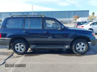2000 Toyota Land Cruiser with VIN JT3HT05J3Y0098534, listed as a IAAI auction lot 41054858 with 336,520 mi miles. Bid and sale history available at carsss.com. Image 13.