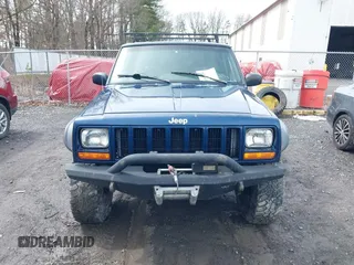 2000 Jeep Cherokee Classic with VIN 1J4FF58SXYL163514, listed as a IAAI auction lot 41920054 with 259,677 mi miles. Bid and sale history available at carsss.com. Image 6.