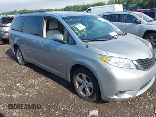 2014 Toyota Sienna LE AAS with VIN 5TDKK3DC2ES431811, listed as a IAAI auction lot 42580165 with 165,824 mi miles and . Bid and sale history available at DreamBid. Image 1.