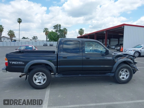 2003 Toyota Tacoma PreRunner z VIN 5TEGN92N03Z210194, wystawiony jako IAAI lot #42243037 z przebiegiem 241 047 mil mil oraz . Historia ofert i sprzedaży dostępna na DreamBid. Obrazek 13.