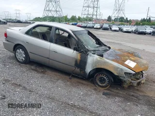 1999 Honda Accord LX with VIN 1HGCG6659XA113823, listed as a IAAI auction lot 42462228 with Not provided miles and . Bid and sale history available at DreamBid. Image 1.