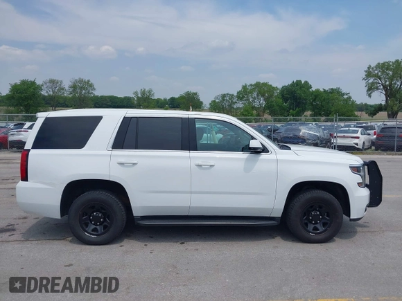 2018 Chevrolet Tahoe Commercial z VIN 1GNSKDEC8JR238969, wystawiony jako IAAI lot #42440047 z przebiegiem 126 373 mil mil oraz . Historia ofert i sprzedaży dostępna na DreamBid. Obrazek 13.