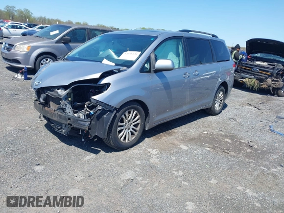 2013 Toyota Sienna XLE AAS with VIN 5TDYK3DC7DS299024, listed as a IAAI auction lot 42055130 with 349,520 mi miles. Bid and sale history available at carsss.com. Image 2.