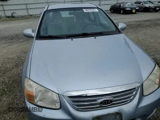 2007 Kia Spectra EX with VIN KNAFE121875438749, listed as a Copart auction lot 60255525 with 171,182 mi miles and Salvage title. Bid and sale history available at DreamBid. Image 13.