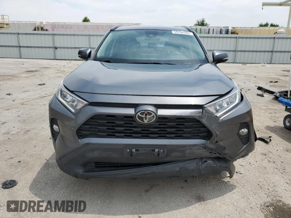 2021 Toyota RAV4 XLE with VIN 2T3W1RFVXMC102648, listed as a Copart auction lot 59706965 with 85,545 mi miles and Salvage title. Bid and sale history available at DreamBid. Image 5.