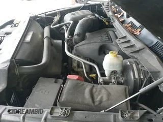 2014 Ram 1500 Tradesman z VIN 1C6RR7FT0ES215646, wystawiony jako IAAI lot #42367423 z przebiegiem 132 861 mil mil oraz . Historia ofert i sprzedaży dostępna na DreamBid. Obrazek 19.