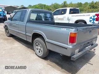 1992 Mazda B-Series Truck with VIN JM2UF313XN0306779, listed as a IAAI auction lot 42104583 with 137,826 mi miles and . Bid and sale history available at DreamBid. Image 3.