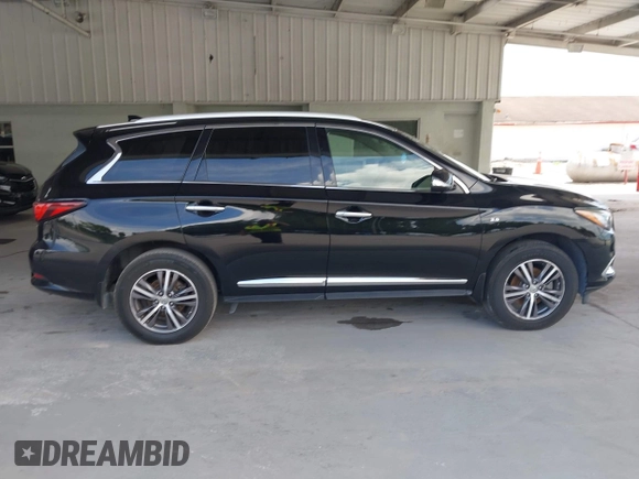 2019 Infiniti QX60 Luxe with VIN 5N1DL0MN9KC511685, listed as a IAAI auction lot 42669346 with 249,322 mi miles and . Bid and sale history available at DreamBid. Image 13.