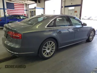 2015 Audi A8 with VIN WAUJGAFD3FN016587, listed as a Copart auction lot 60778904 with 116,818 mi miles and Clean title. Bid and sale history available at DreamBid. Image 3.