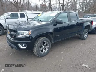 2019 Chevrolet Colorado 4WD Z71 z VIN 1GCGTDEN6K1181460, wystawiony jako IAAI lot #41815027 z przebiegiem 103 283 mil mil oraz . Historia ofert i sprzedaży dostępna na DreamBid. Obrazek 2.