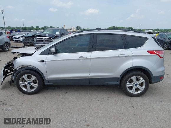 2013 Ford Escape SE with VIN 1FMCU0GX9DUD68711, listed as a IAAI auction lot 42243521 with 120,441 mi miles and . Bid and sale history available at DreamBid. Image 14.