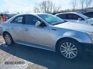 2013 Cadillac CTS Luxury z VIN 1G6DG5E56D0112860, wystawiony jako IAAI lot #41970874 z przebiegiem 125 647 mil mil oraz . Historia ofert i sprzedaży dostępna na DreamBid. Obrazek 13.