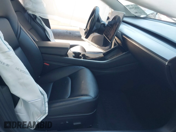 2018 Tesla Model 3 Long Range Battery with VIN 5YJ3E1EA7JF163401, listed as a IAAI auction lot 41829681 with 90,065 mi miles. Bid and sale history available at carsss.com. Image 5.