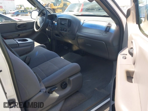 2003 Ford F-150 with VIN 1FTRX17W83KB15716, listed as a IAAI auction lot 42136249 with 169,560 mi miles and . Bid and sale history available at DreamBid. Image 5.