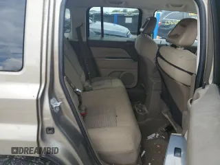 2007 Jeep Patriot Sport z VIN 1J8FF28W07D297912, wystawiony jako Copart lot #57045335 z przebiegiem 286 621 mil mil oraz Szkoda całkowita • Salvage title. Historia ofert i sprzedaży dostępna na DreamBid. Obrazek 10.
