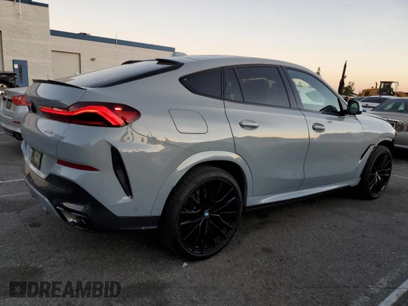 2024 BMW X6 xDrive40i with VIN 5UX33EX04R9T50214, listed as a Copart auction lot 85332204 with 8,710 mi miles and Salvage Title. Bid and sale history available at carsss.com. Image 3.