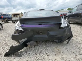 2003 Nissan 350Z Touring z VIN JN1AZ34E43T006603, wystawiony jako Copart lot #57073495 z przebiegiem 236 676 mil mil oraz Szkoda całkowita • Salvage title. Historia ofert i sprzedaży dostępna na DreamBid. Obrazek 6.