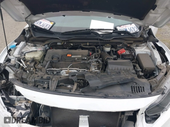 2020 Honda Civic LX with VIN 2HGFC2F64LH593100, listed as a IAAI auction lot 41877572 with 76,713 mi miles and . Bid and sale history available at DreamBid. Image 10.