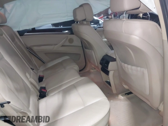 2012 BMW X5 35i z VIN 5UXZV4C54CL748257, wystawiony jako IAAI lot #42036669 z przebiegiem 122 438 mil mil oraz . Historia ofert i sprzedaży dostępna na DreamBid. Obrazek 8.
