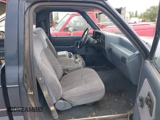 1990 Ford Ranger XLT z VIN 1FTCR10X1LPB26207, wystawiony jako IAAI lot #42306083 z przebiegiem 39 173 mil mil oraz . Historia ofert i sprzedaży dostępna na DreamBid. Obrazek 5.