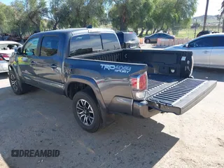 2023 Toyota Tacoma 4WD SR with VIN 3TMCZ5AN1PM600236, listed as a IAAI auction lot 41603152 with 35,956 mi miles. Bid and sale history available at carsss.com. Image 3.