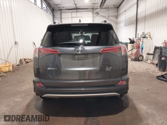 2016 Toyota RAV4 XLE with VIN 2T3RFREV5GW534129, listed as a IAAI auction lot 42359801 with 52,025 mi miles and . Bid and sale history available at DreamBid. Image 17.
