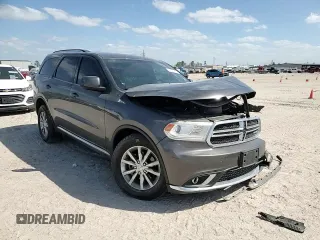 2018 Dodge Durango SXT with VIN 1C4RDJAG0JC329682, listed as a Copart auction lot 49541005 with 102,596 mi miles and Salvage Title. Bid and sale history available at DreamBid. Image 12.