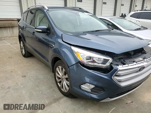 2018 Ford Escape Titanium with VIN 1FMCU9J93JUC01903, listed as a Copart auction lot 57337045 with 59,276 mi miles and Salvage title. Bid and sale history available at DreamBid. Image 14.