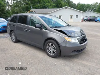 2011 Honda Odyssey EX-L z VIN 5FNRL5H69BB047407, wystawiony jako IAAI lot #42676347 z przebiegiem 118 325 mil mil oraz . Historia ofert i sprzedaży dostępna na DreamBid. Obrazek 1.