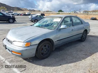1996 Honda Accord LX with VIN 1HGCD5634TA291036, listed as a IAAI auction lot 41583543 with 166,725 mi miles and . Bid and sale history available at carsss.com. Image 18.