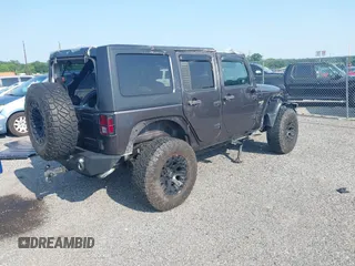 2016 Jeep Wrangler Unlimited Sport with VIN 1C4BJWDG9GL211030, listed as a IAAI auction lot 42459945 with 61,671 mi miles and . Bid and sale history available at DreamBid. Image 4.