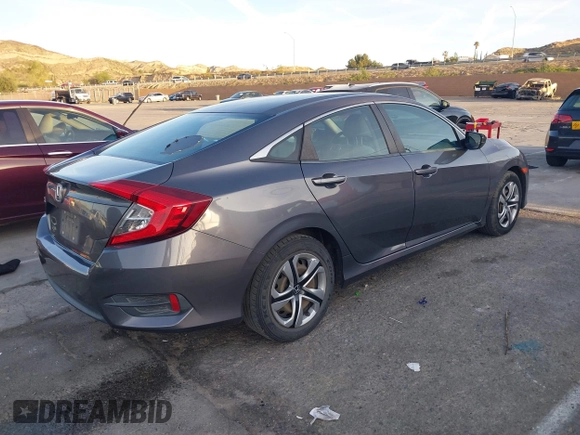 2016 Honda Civic Sedan LX with VIN 2HGFC2F55GH532108, listed as a IAAI auction lot 41860382 with 124,106 mi miles. Bid and sale history available at carsss.com. Image 4.