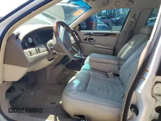2001 Lincoln Town Car Cartier L z VIN 1LNHM85W71Y624315, wystawiony jako Copart lot #60479385 z przebiegiem 171 485 mil mil oraz Czysty tytuł • Clean title. Historia ofert i sprzedaży dostępna na DreamBid. Obrazek 7.