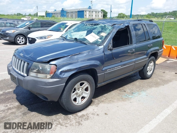 2004 Jeep Grand Cherokee Laredo with VIN 1J4GX48S44C205469, listed as a IAAI auction lot 42310571 with 154,929 mi miles and . Bid and sale history available at DreamBid. Image 18.