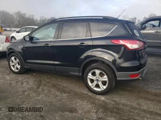 2014 Ford Escape SE with VIN 1FMCU9GX2EUC86115, listed as a Copart auction lot 82810324 with 212,346 mi miles and Salvage Title. Bid and sale history available at DreamBid. Image 2.