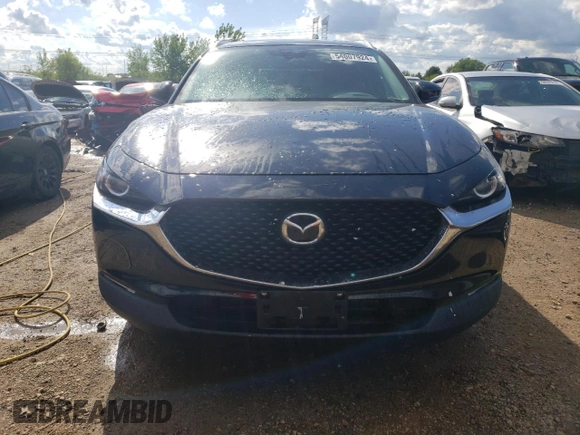 2022 Mazda CX-30 2.5 Turbo with VIN 3MVDMBAY0NM447128, listed as a Copart auction lot 54007924 with 10,596 mi miles and Salvage Title. Bid and sale history available at DreamBid. Image 5.
